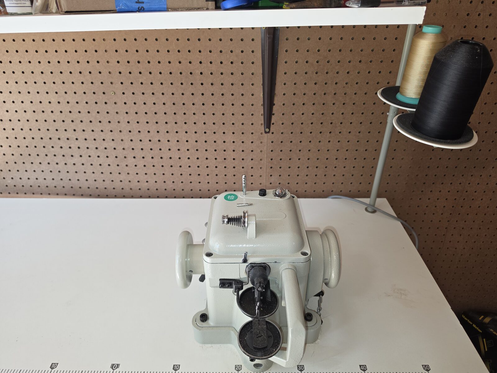 Fur sewing machine in the shop